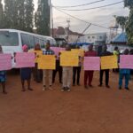 VIDEO: Abuja residents storm popular radio station, stage protest over demolition of houses